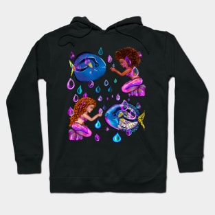 Best fishing gifts for fish lovers 2022. anime mermaid with blue tang fish and rain drops. Cute black  and white girls with Afro hair, green eyes, Cherry pink lips and dark brown skin. Hair love ! Hoodie